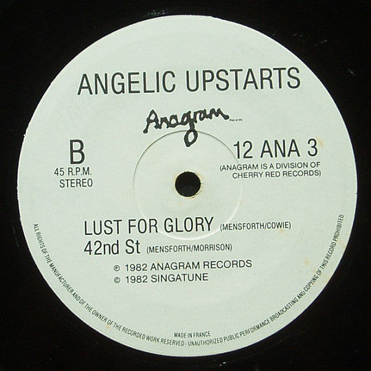 Angelic Upstarts : Woman In Disguise (12", Single)