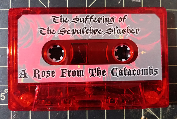 A Rose From The Catacombs And Wretched Crawler : The Suffering Of The Sepulchre Slasher (Cass, Album, Ltd)