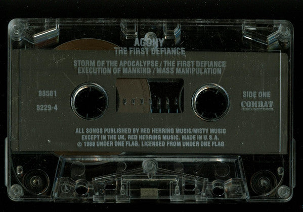 Agony* : The First Defiance (Cass, Album)